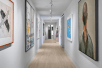 Inside corridors with contemporary, beautiful, original artwork in the hallways at 21c Museum Hotel Kansas City.