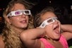 A couple of tour guests watching the fireworks with 3D classes on the 3D Fireworks Cruise in Chicago Illinois.