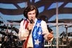 Keith Allynn wears a patriotic vest while performing