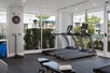 Fitness room by the pool with view of the pool at B Resort, Lake Buena Vista, FL.