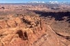 The seemingly endless red rock landscape of the Backcountry Arches Moab Helicopter Tour in Moab Utah, USA.
