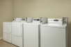 Laundry Facility at Baymont by Wyndham Modesto Salida.