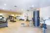 Fitness center with weights and tread mill.