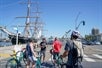 Unlimited Biking renters with their tour guide stopping at San Diego USS Midway.