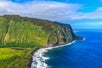 The shoreline and cliffside of a mountain on Big Island's Kohala Coast Adventure Helicopter Tour in Hawaii USA.