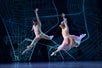 Two dancers synchronized in an allegro performance during Bob Fosse's DANCIN' on Broadway NYC. 