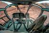 The cockpit of a Maverick Airbus helicopter with the majestic view of the Grand Canyon below them.