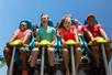 People screaming and while riding Fury 325 on a sunny day at Carowinds in Charlotte, North Carolina.