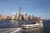 The Circle Line Bronx cruising by Lower Manhattan with the cityscape in the background