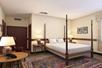 Spacious room featuring one king bed, providing comfort and relaxation for a restful stay.