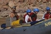 Guests are in awe of the Colorado River while riding their inflatable kayaks.