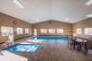 Indoor pool with seating.