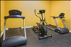 Fitness facility with cardiovascular equipment.