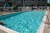 Outdoor pool on property.