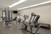 Fitness center with different gym equipment.