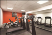 Fitness center with treadmills and elliptical trainer.