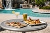 Enjoy a relaxing day with food and beverage in the outdoor pool at Crowne Plaza Orlando Lake Buena Vista.