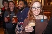 Tourgoers with beer in hand during the DC Insider’s Pub Crawl in Washington, DC.