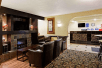 A lobby / lounge with fireplace at Days Inn Charlotte/Woodlawn Near Carowinds.