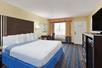 1 King bed, flat-screen TV at Days Inn by Wyndham San Antonio Northwest/SeaWorld, TX.