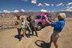 The group posing for their tour guide to take a photo on the Death Valley - Pink Jeep Tour in Las Vegas, NV