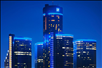 The Renaissance Center buildings at night.