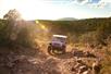 Tour Wrangler driving over rocky terrain on the Diamond Gulch Tour - Pink Jeep Tours in Sedona, Arizona