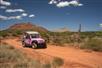 Tour Wrangler driving down a dirt road on the Diamond Gulch Tour - Pink Jeep Tours in Sedona, Arizona