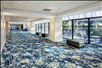 Inside corridors and sitting area overlooking the pool area.