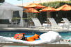Outdoor pool with sun loungers at DoubleTree by Hilton Hotel Anaheim - Orange County, CA.