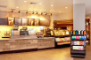 Full service Starbucks coffee shop on the lobby level.