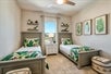 Beautifully decorated guest room with twin beds