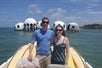 A couple standing on a boat in Chokoloskee Island, Florida.