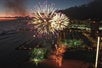 Fireworks are being shot over the Waikiki beach in Waikiki, Hawaii.