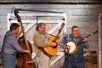 Goldwing Express band with their guitar and banjo entertaining guests at The Funny Farm Dinner in Branson, Missouri
