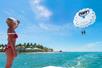 Parasailers in the air on the Fury Water Adventure Parasailing in Key West, Florida.