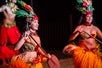 Luau hula dancers performing on stage at Gilligans Bar & Grill located at Maui Nui Golf Course