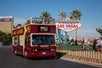 People aboard a red double decker Bus by Big Bus Classic Hop-On Hop-Off Tour with Go Las Vegas Explorer Pass.
