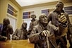 Five life-size, bronze statues of the Founding Fathers at the National Constitution Center in Philadelphia, Pennsylvania.