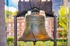 The Liberty Bell, an iconic symbol of American independence in Philadelphia, is featured during the Revolution and Founding Father's Tour.