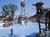 Outdoor pool with a slide at Grand Country Inn Indoor and Outdoor Water Park in Branson, Missouri.