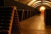 A wine cellar with wine barrels on the Half Day Wine Country Experience in San Francisco California USA.