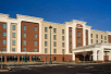 The front exterior and entrance to the Hampton Inn and Suites Pittsburgh Waterfront