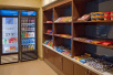 Mini-grocery with snacks and beverages.