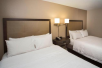 2 Queen Beds at Hampton Inn & Suites Valdosta Conference Center.