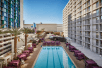 Outdoor pool with sun loungers and cabanas at Harrah's Las Vegas Hotel & Casino, Las Vegas, NV.  