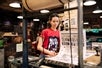 A woman works in the print shop