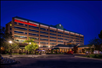 Exterior view of the hotel at night.