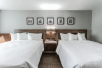 Guest room with 2 double beds at Hilton Garden Inn Philadelphia Center City, Philadelphia, PA.