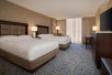 2 Double beds, flat-screen TV, work desk at Hilton Downtown Tampa, FL.